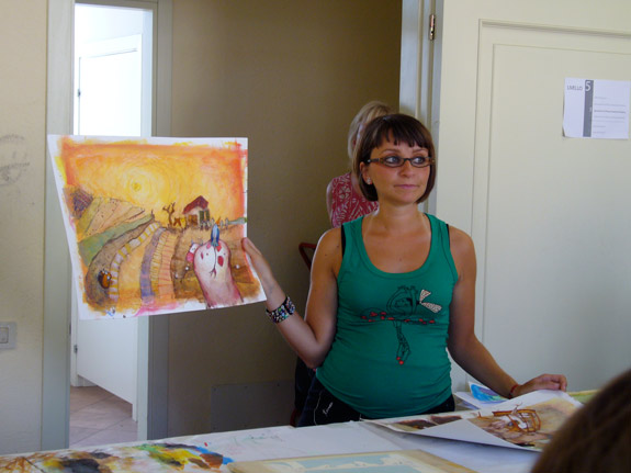 AnnaLaura holding my artwork